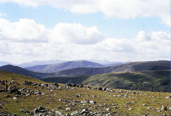 Summit Harter Fell; Crinkle Crags, Scafell and Gable in background. Sep 66